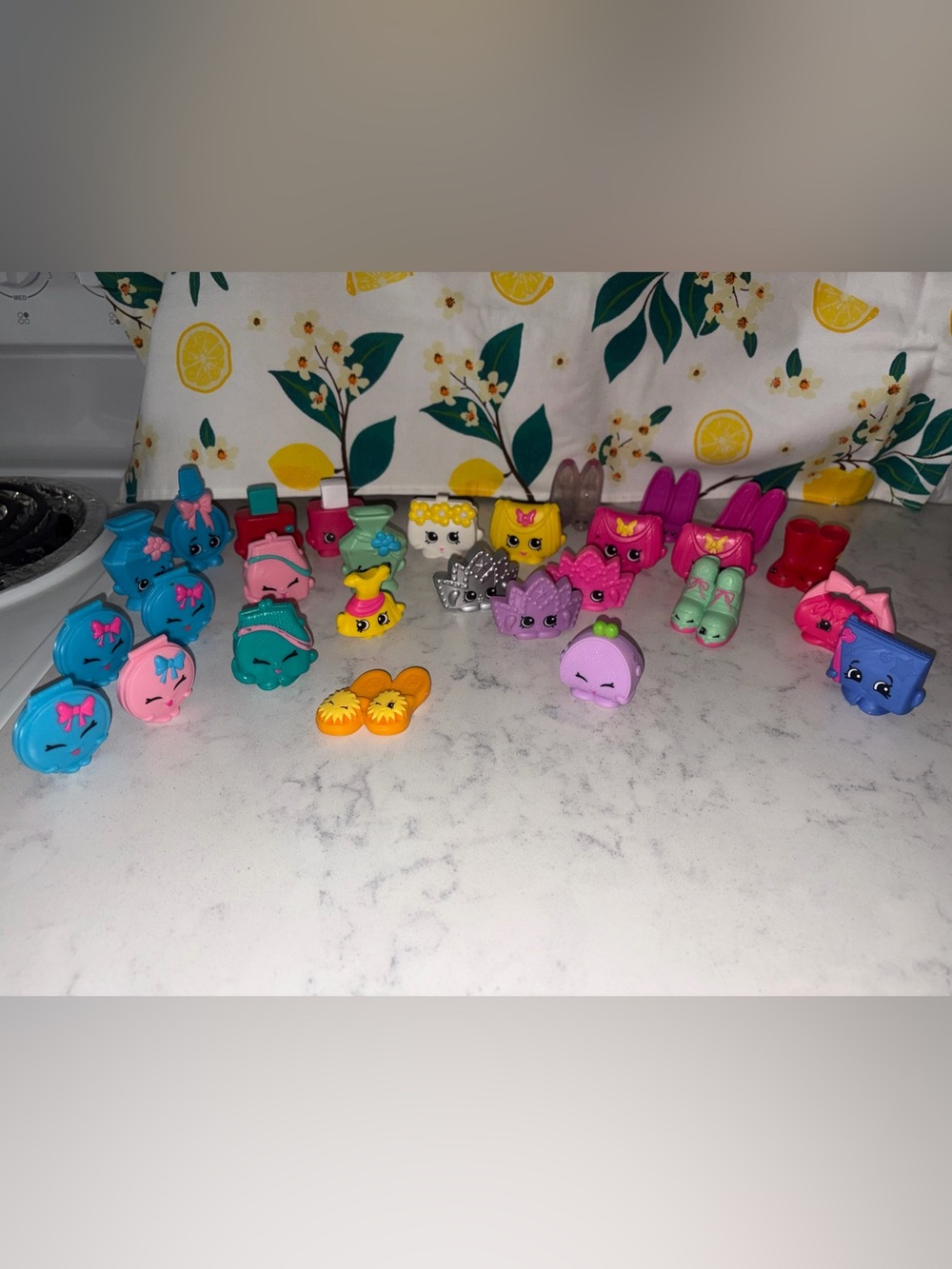 28 Larger Shopkins.